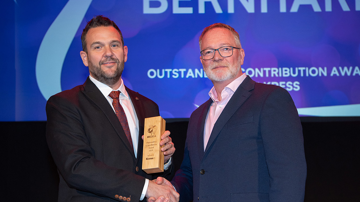 Steve Nixon (left) accepted the Outstanding Contribution Award with Kress on behalf of Stephen Bernhard.jpg